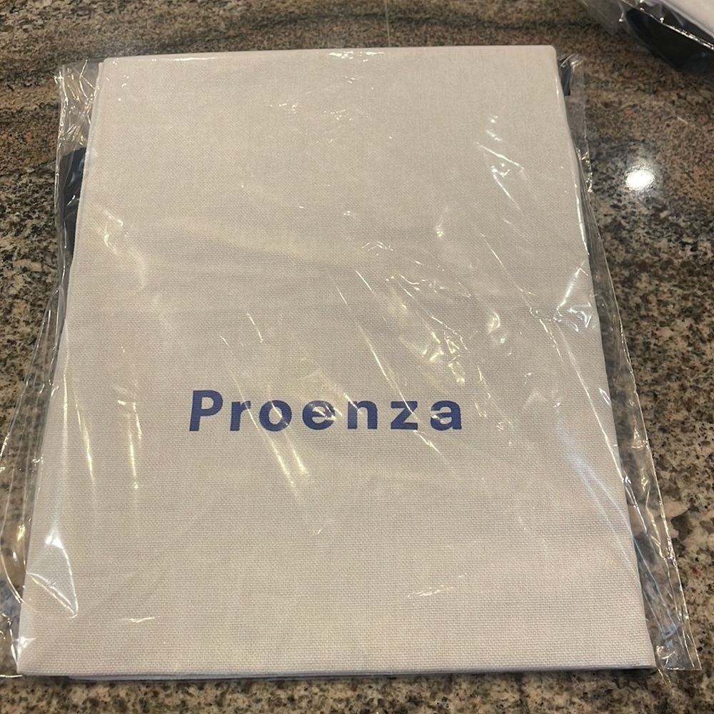 Proenza Schouler Designer purse does cover bag.